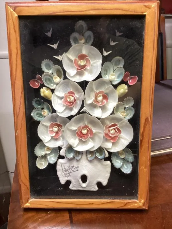 Framed seashell flower arrangement