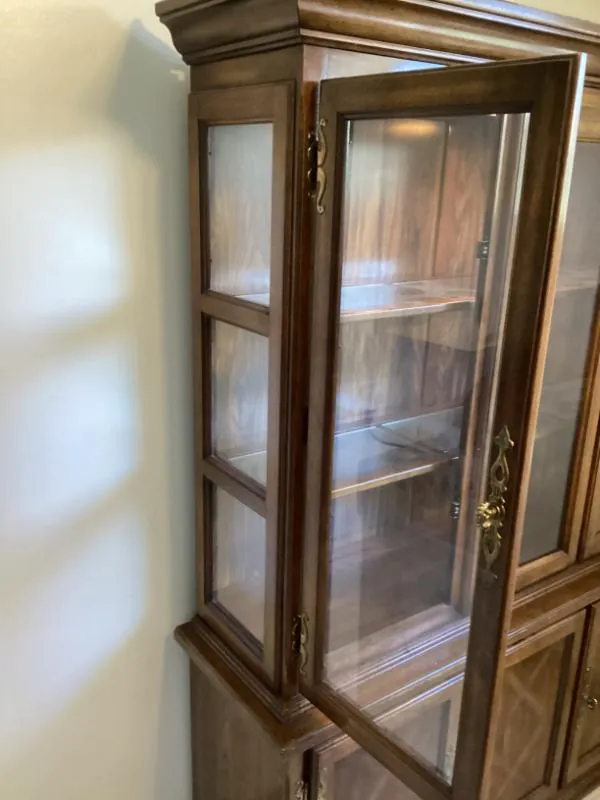 Wood curio cabinet with glass shelves