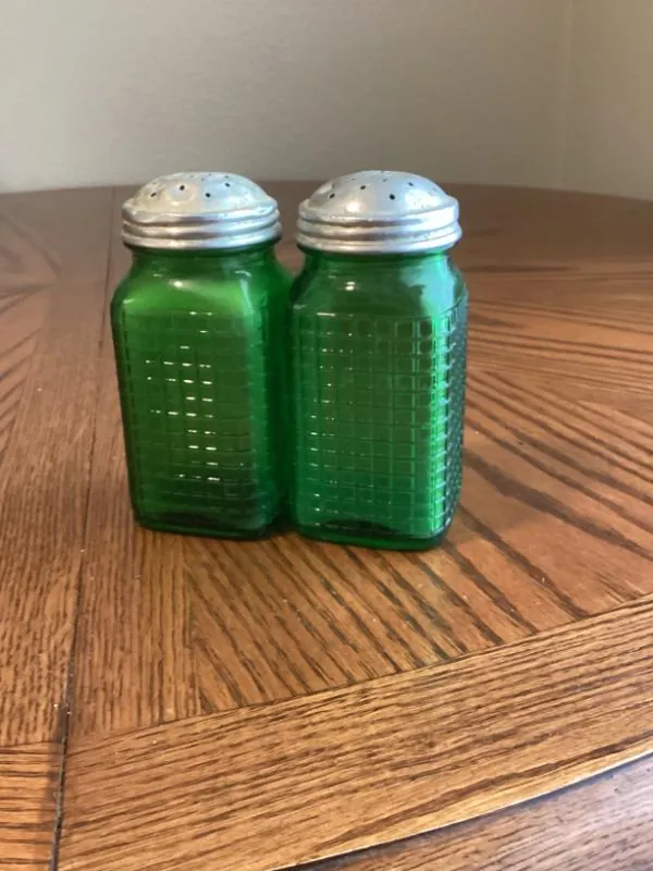 Green glass salt and pepper shakers