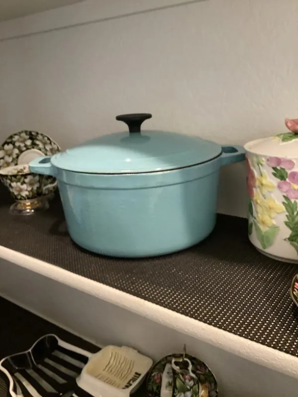 Turquoise Dutch oven and floral canisters