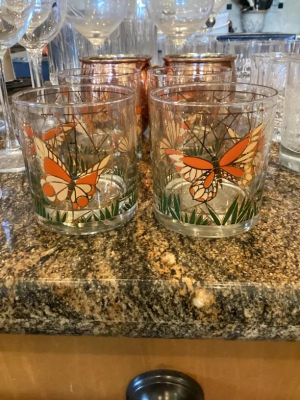 Glasses with a butterfly print