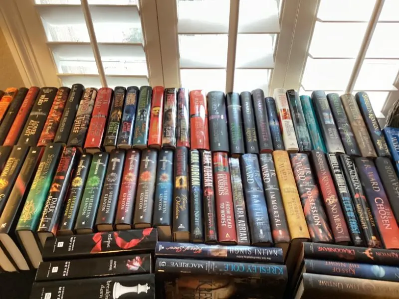 Table covered with hardcover books