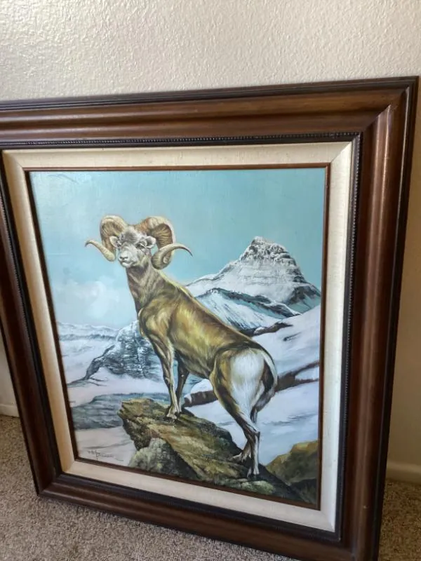Framed painting of a bighorn sheep