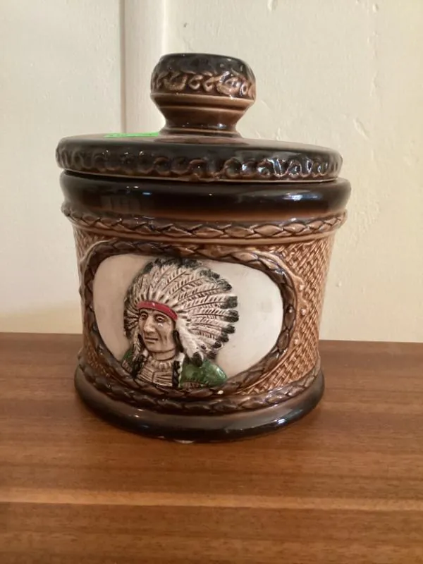Ceramic lidded jar with a painted portrait