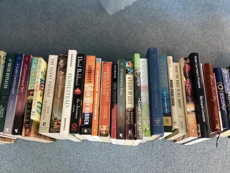 Rows of books on the floor