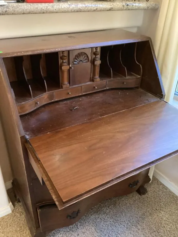 Secretary desk opened to show its cubbies