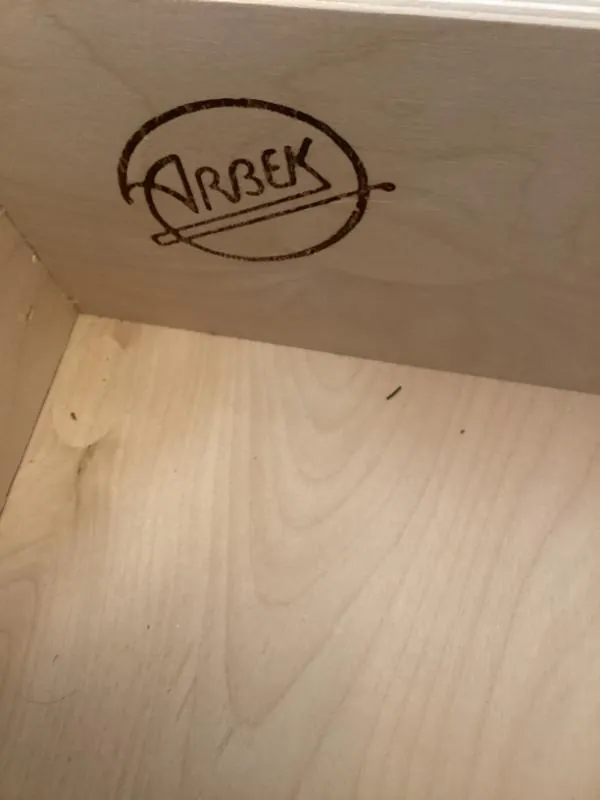 Arbek maker's stamp inside a drawer