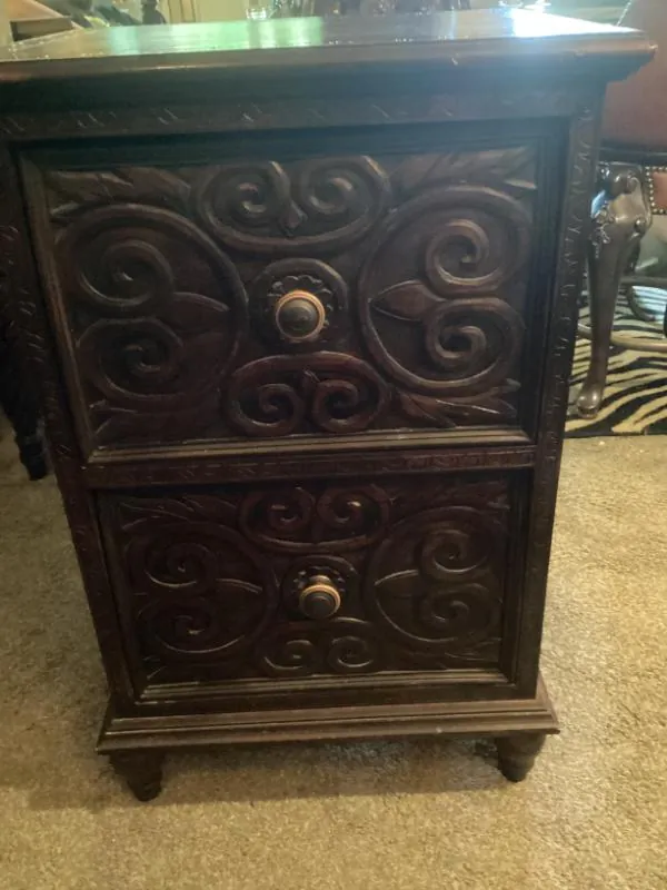 Carved dark wood cabinet