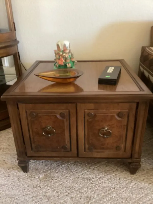 Wood end table with cabinet doors