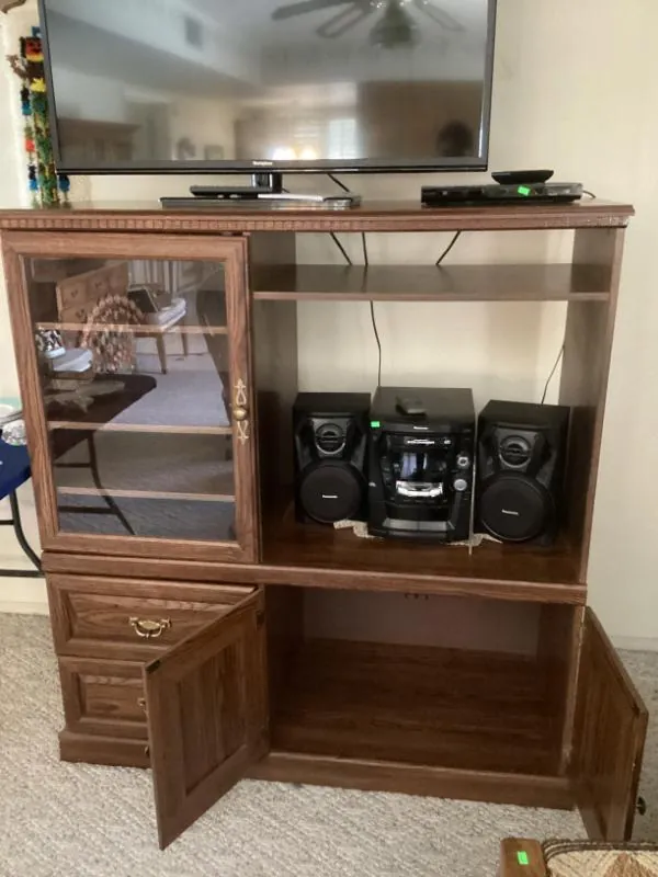 Wood entertainment center with a stereo
