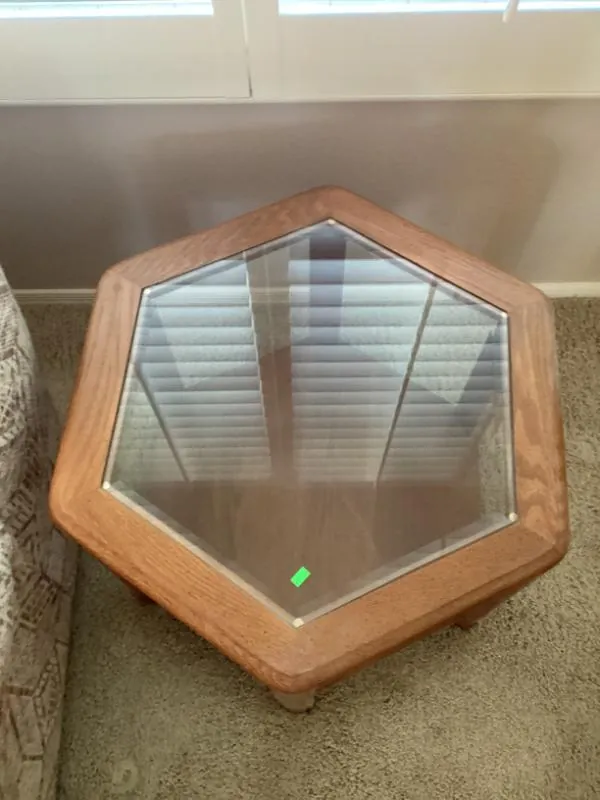Hexagonal oak end table with a glass top