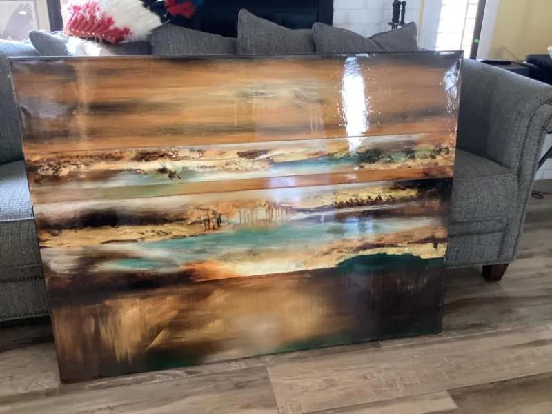 Abstract painting in blues and golds