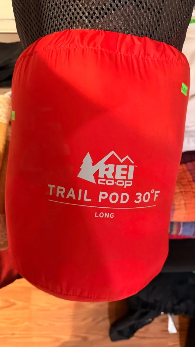 Red REI Trail Pod sleeping bag