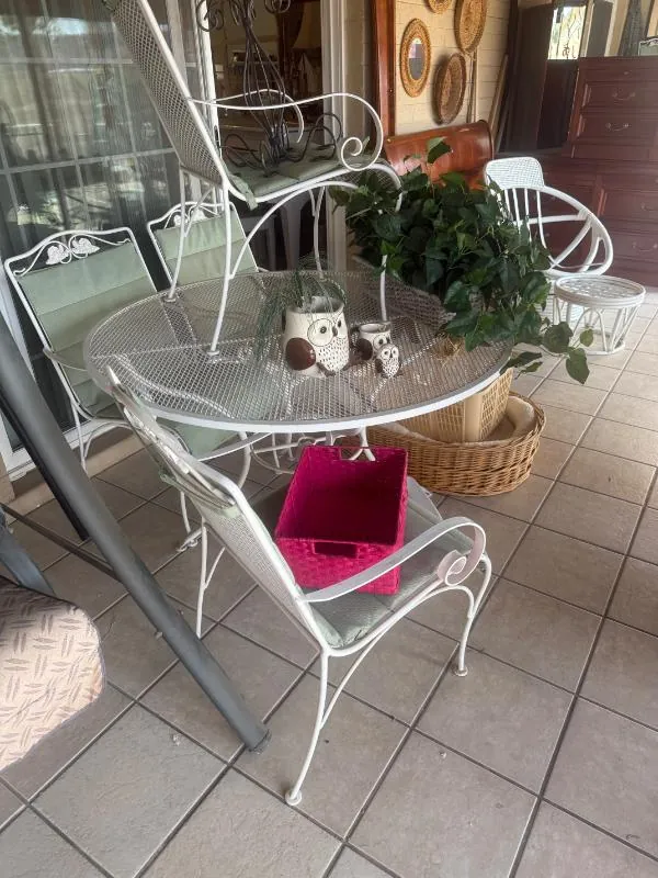 White metal patio table and chairs