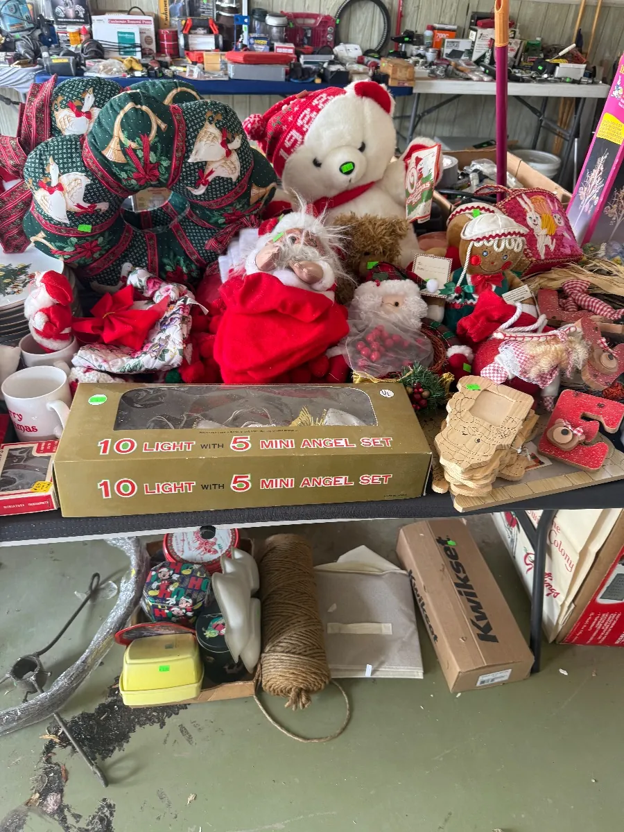 Table of Christmas decor and holiday stuffed animals