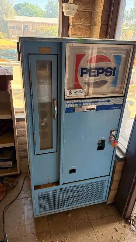 Vintage blue and white Pepsi vending machine