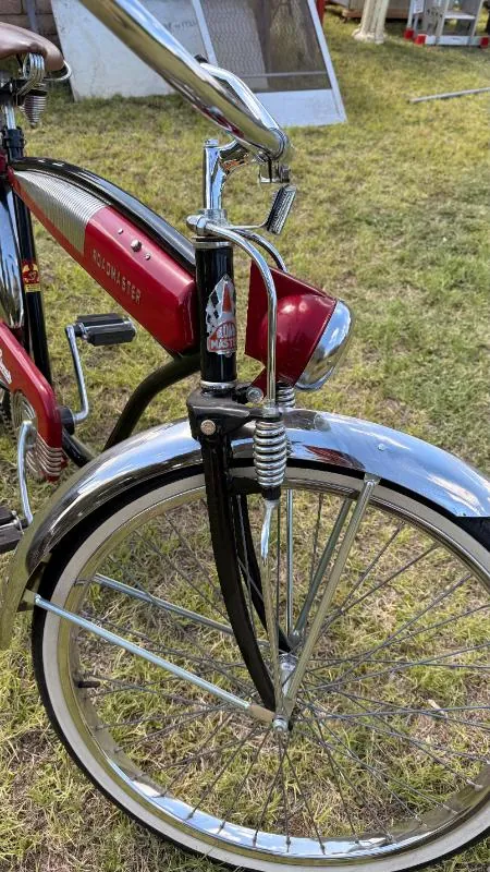 Red vintage-style bicycle on the grass
