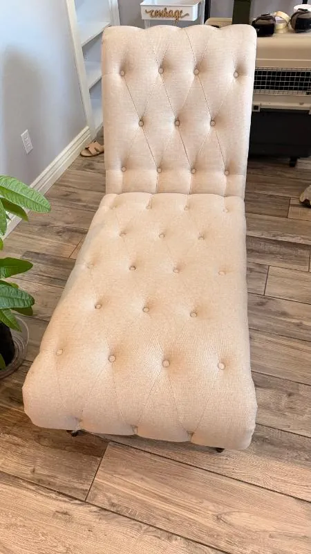 Tufted cream chaise lounge