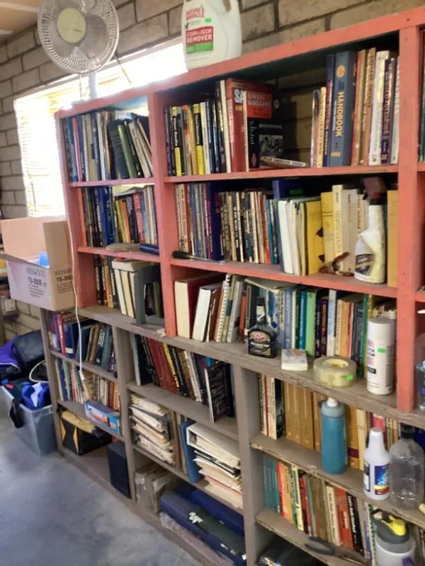 Tall bookshelves full of books
