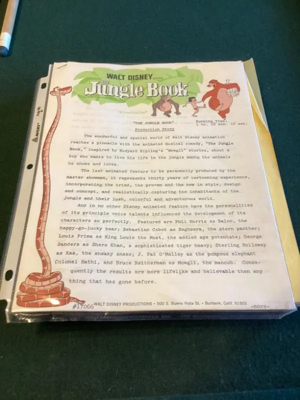 Walt Disney's Jungle Book script page in a binder