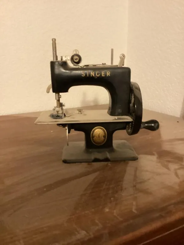 Small black Singer sewing machine
