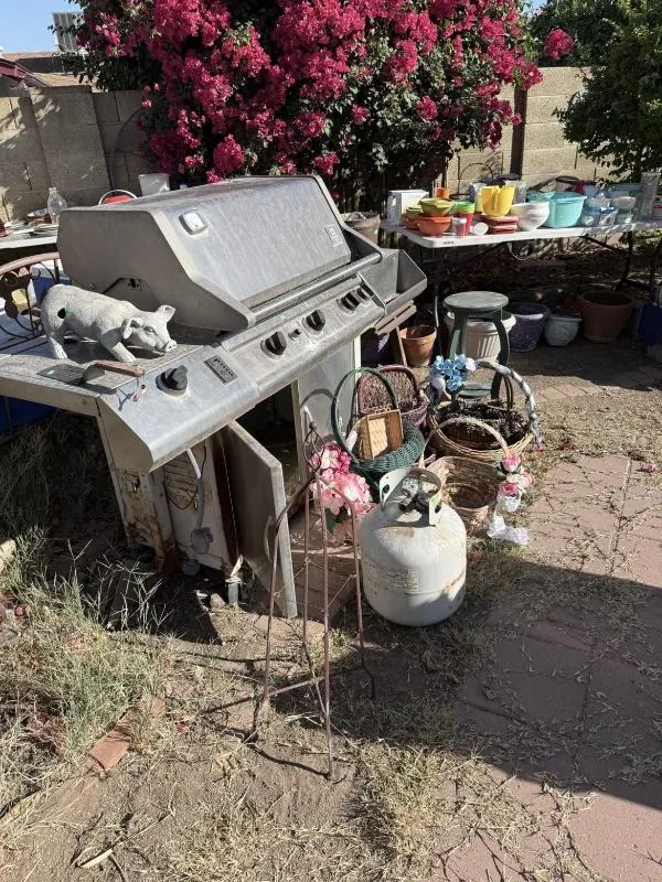 Stainless steel grill in the yard
