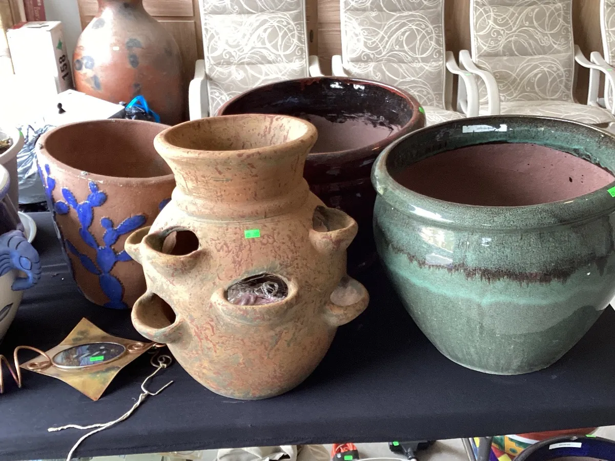 Clay strawberry pot and glazed planters
