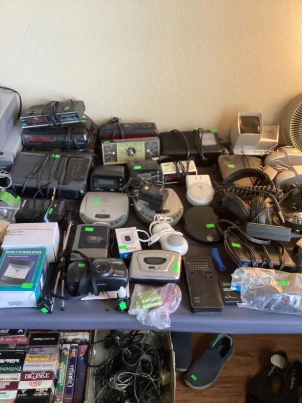 Table of electronics, remote controls and phones