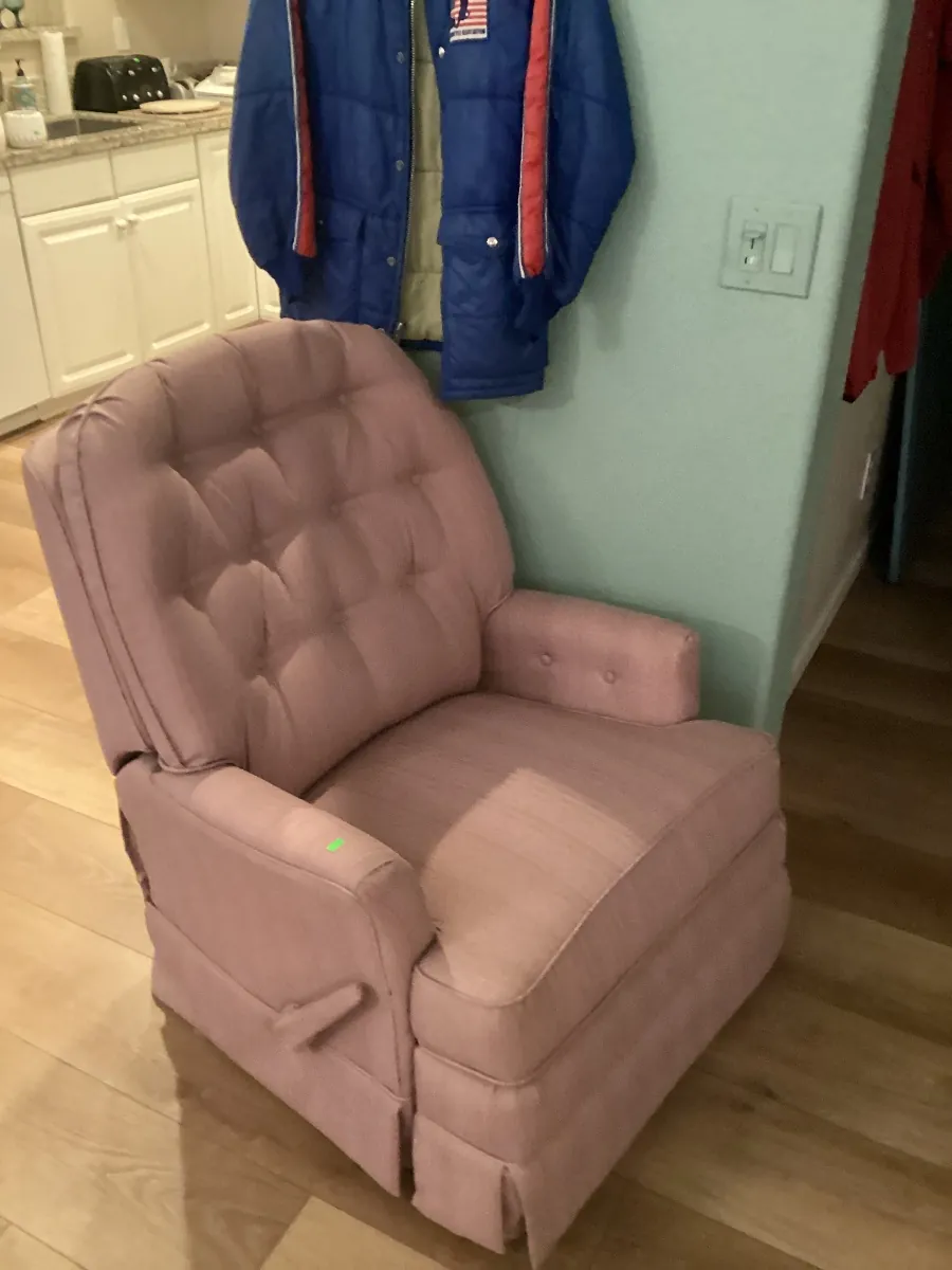 Pink upholstered recliner