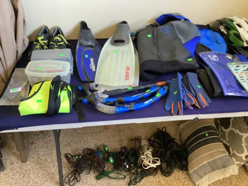 Swim fins and snorkel gear on a table