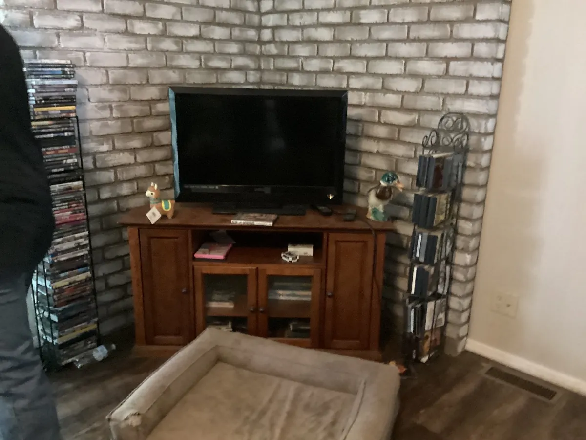Corner entertainment center with a flat-screen TV